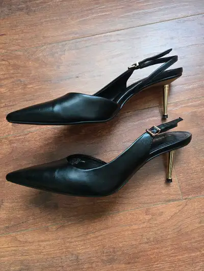Express shiny golden heels, View more
