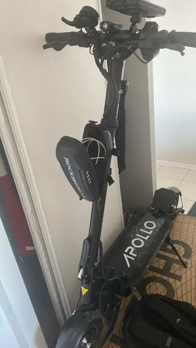 Apollo ghost scooter with hydrolic breake , and coming with lot of extra - faster charger - bike hel...