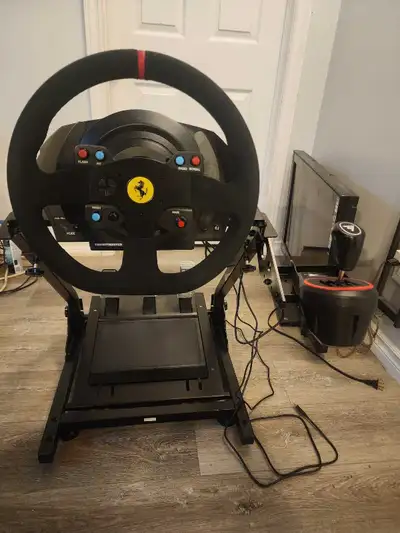 Selling a used Thrustmaster T300rs Ferrari edition racing wheel for PS5/PS4 and PC with Vevor wheel...