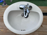 Sink like new with faucets and drains
