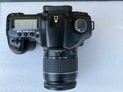 Canon 5D Classic with Canon 28-80mm lens and Canon BG-E4 grip. All items are in excellent condition....