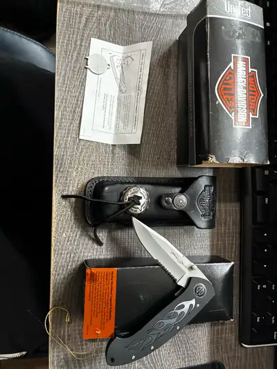 Brand new HD32 The Harley-Davidson Large FLAMING LEGEND Knife with Leather Sheath is a collectible i...