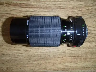 Sanwa 35mm Camera Lens for sale Not sure what it fits, has this number on it 1063702, lens made in J...