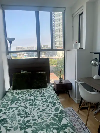 Looking for a female roommate to share this cozy and bright apartment! The space features a modern k...