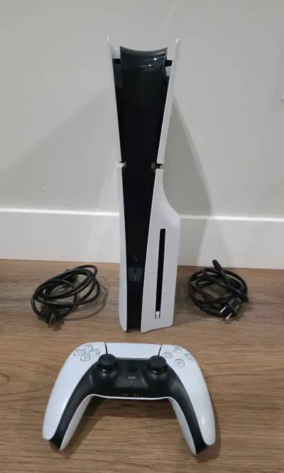 Ps5 slim Disc used with 1controller power cord, hdmi cable ps5 works great delivery available