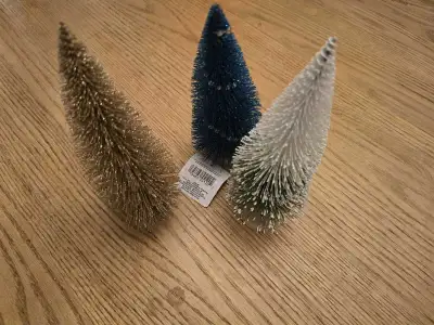 Add some holiday cheer to your home with these adorable miniature decorative Christmas trees! This s...
