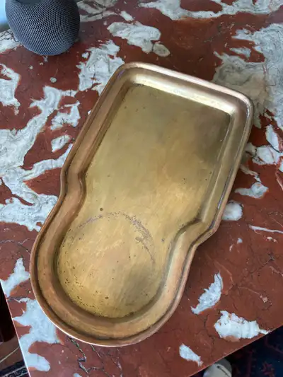 An antique hand-made brass samovar tray 13.3” long, 8” wide