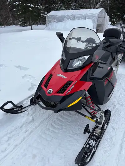 Avec roues skis