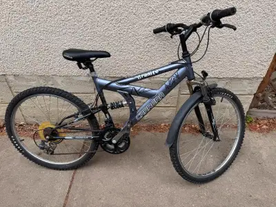 Carrera Granite 21 Speed Full Suspension Bike with Shimano gears. Probably needs a tune-up. Comes wi...