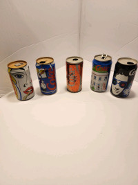 Vintage colored Coca-Cola cans
