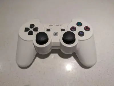 PlayStation 3 Original wireless controller Dualshock 3 White Tested, no stick drifts or any issues....