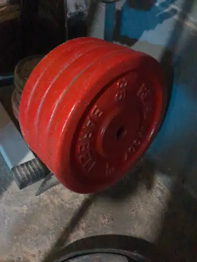 2 x Red Real McCoy 35lbs cast iron weights. In really great condition, some wear. **Only 2 for sale....
