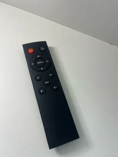 This is a u Nebula projector remote. It’s fully functional and ready to control your projector. It’s...