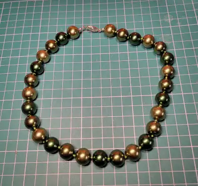 Beautiful gold and green beaded 18"  necklace. , View more