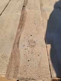 Rough cut tamarack Dimensional lumber
