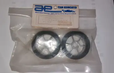 These are "T" High Traction Rubber Part # 3669 front wheel/tire combo for a 1/12 scale pan car. New...