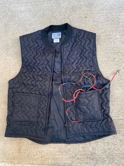 Men’s Black Jack heated motorcycle vest. Size 44. Good condition. Includes wiring to connect to m/c...