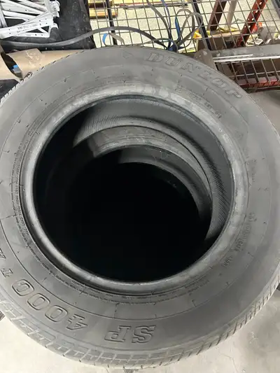 Dunlop SP Sport 4000 in size 215/65R16. Around 60-65% tread left. All 4 together.