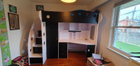 Loft bed with desk and storage