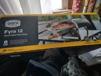 Ooni Fyra 12 wood pellet fired pizza oven. New in box, all parts