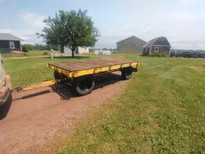 Deck is 11 ft x 7 ft very well built has stake pockets 6,000 lb capacity has 16 inch tires tows well...