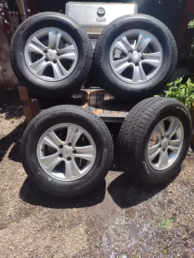 Practically brand new: Imperial all season ( winter rated) tires. Size - 235/65r/16. Bought 3weeks a...