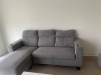  Grey L shaped couch comes with charging station and cup holder 