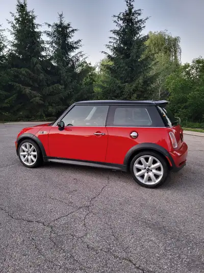 This 2006 Mini Cooper S is powered by a supercharged 1.6-liter inline-four linked to a six-speed man...