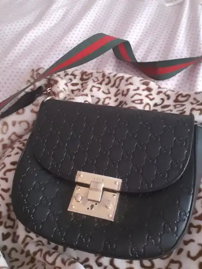 Gucci Guccissima Crossbody in Black Leather with Golden padlock, View more