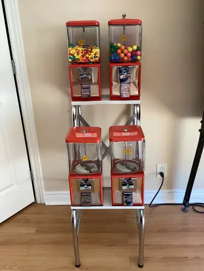 Rare Northwestern gumball candy dispenser comes with key and stand. Three dispensers operate with a...