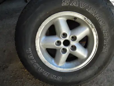 4 Jeep rims and tires.O235-75 R15. 60% tread. Asking $250. phone if interested 403-560-1521