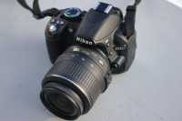 Nikon D3100 DSLR w/ 18-55mm Lens