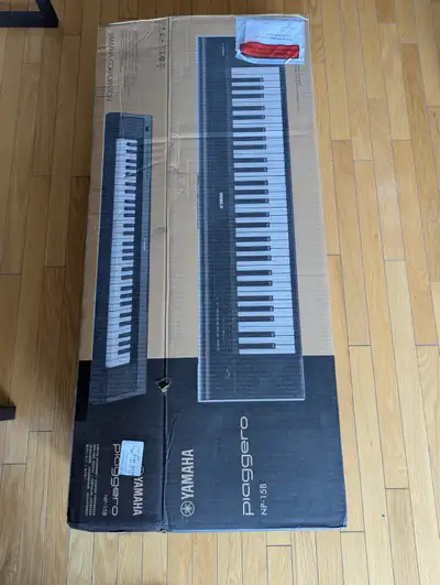 Yamaha NP15B Piaggero 61-Key Ultra-Portable Digital Piano, Touch, View more