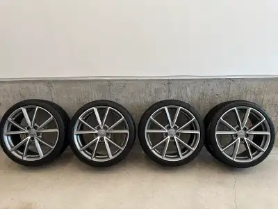 Up for sale is a set of used Audi rims (Audi part #8V0 601 025 FE) made in Germany, with Michelin Pi...
