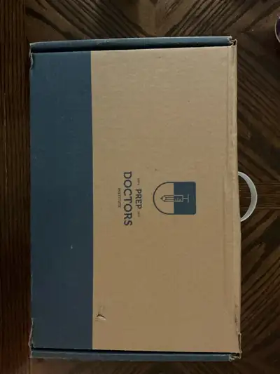 Prep Docs Afk notes and question booklet with handwritten notes.