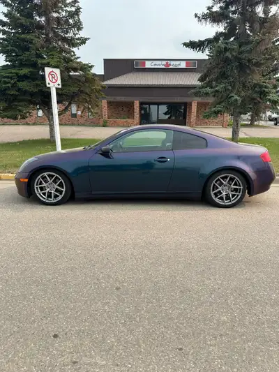 2005 infiniti g35 coupe AUTOMATIC , wrapped in deep space with 190,000km, has a sun roof, plenum spa...