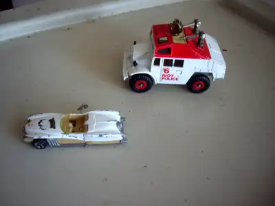CORGI quad tractor 4inch l, riot police $18 HOT WHEELS 1990 mattel car $4