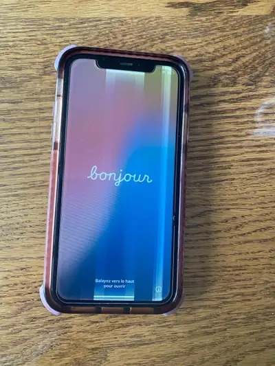 Unlocked iPhone 11 64gb. Screen protector is on, no scratches on actual screen. Screen has streaks t...