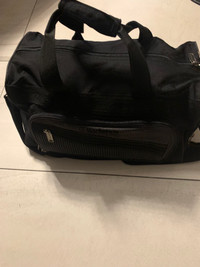 Small black luggage bag with shoe compartment 