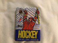 1989-90 TOPPS hockey unopened pack of 12 cards and 1 sticker