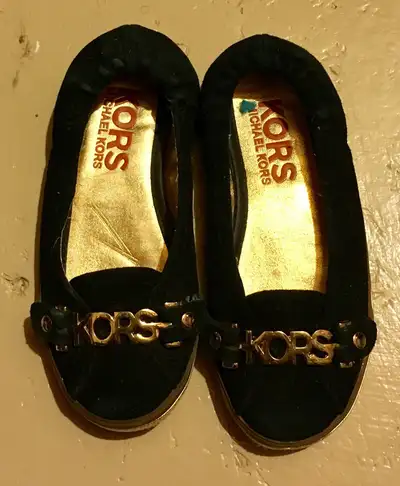 This for a little girl's size 13 black velvet Michael Kors ballet flat dressy shoe. So this is rough...