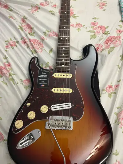 Heres a mint condition American pro. 2 Stratocaster with all the case candy and fender factory case...