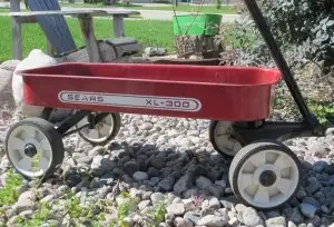 Vintage little Red flyer style wagon A little dusty and rusty but this vintage red wagon will be gre...