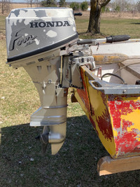 14’ aluminum boat, honda outboard and trailer 