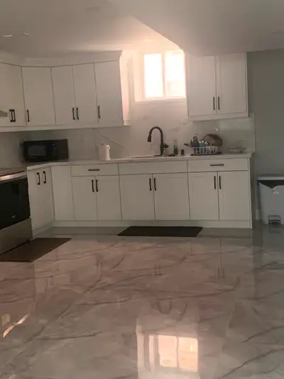Shared basement apartment available July 1.