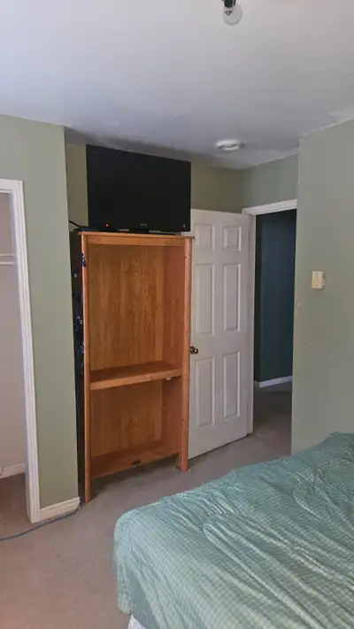 Partially furnished room for rent in fox trap conception bay south room comes with queen size bed tv...