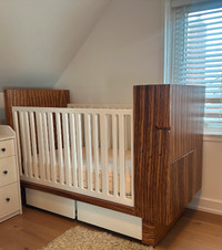 Baby combo crib with the change table and storage.