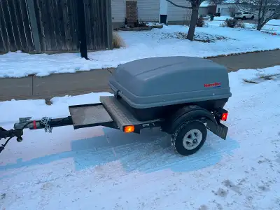 Pull behind motorcycle or car trailer. Alberta registered and ready to go all lights work. Call or t...