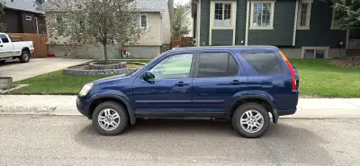 This 2004 Honda CRV is a reliable AWD SUV featuring leather interior, a sunroof, and heated seats, m...