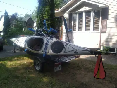 Kayak de mer et sa remorque multi loisirs. , View more